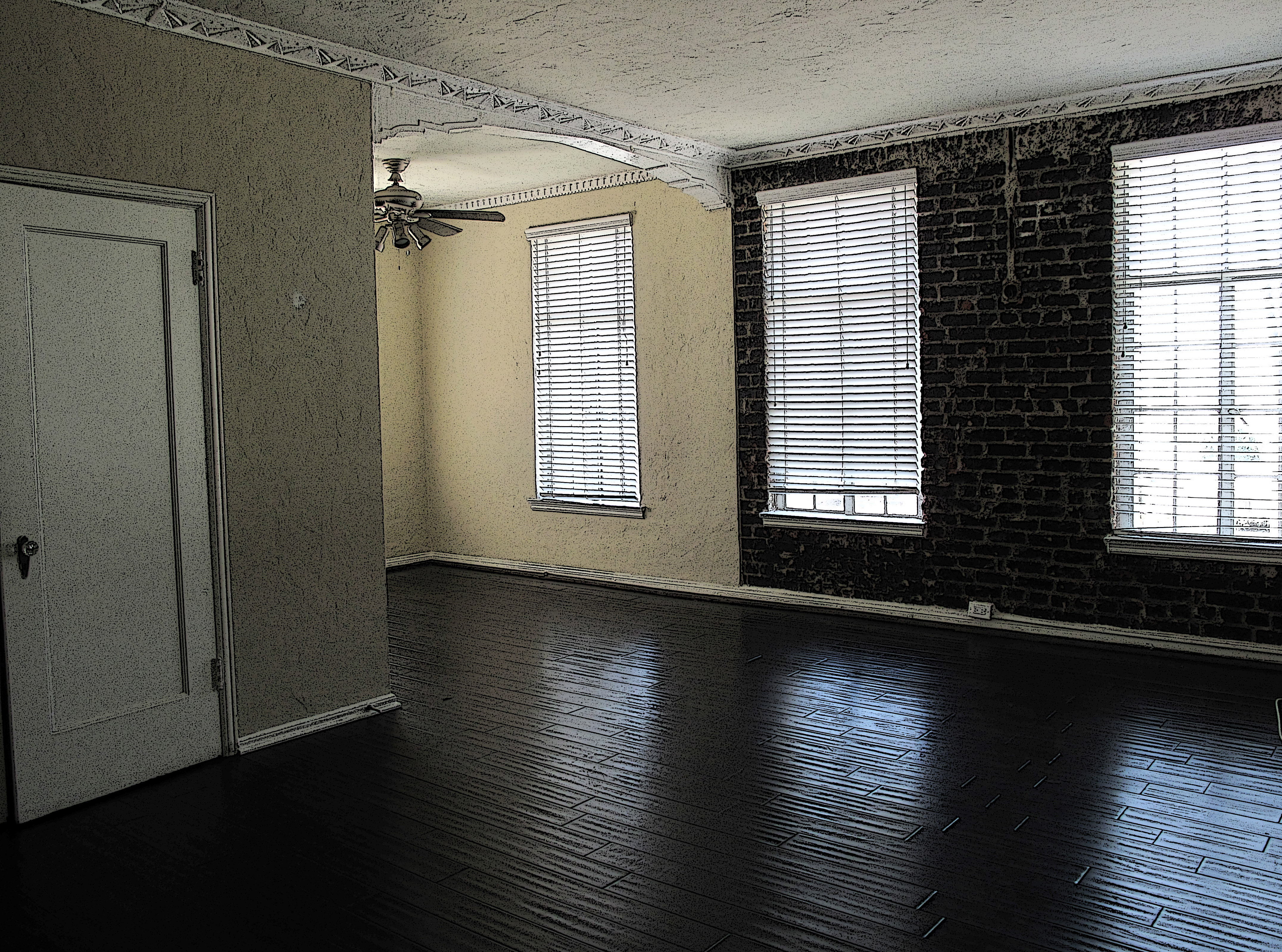 Empty apartment with hardwood floors — move-out cleaning by Aquamen Cleaning